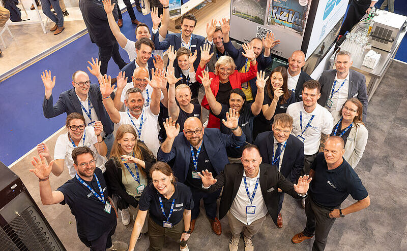 Gruppenbild der BWE Party von der Windenergie Messe aus Husum